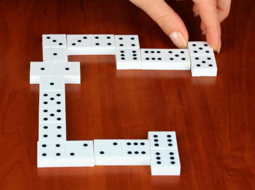 Some domino games require that certain numeric combinations, like a multiple of 5, be reached by a tile or set.