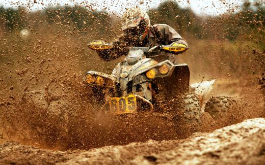 Light vehicles, such as 4-wheeled ATVs and motorcycles, are used in both head to head and slalom mud races.
