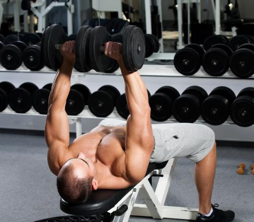 A weight bench supports the individual when he or she is training with weights.
