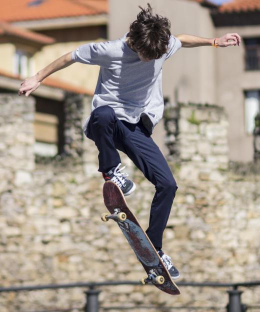Before attempting a kickflip, a skateboarder must master jumping their board into the air.