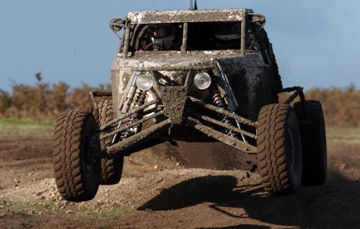 Modified stock vehicles, dune buggies, and trucks are often used in mud racing.