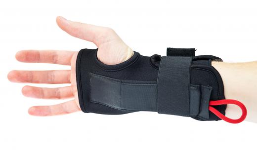 Medical professionals may apply a wrist brace for injuries to the wrist.