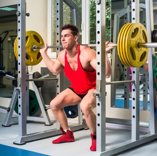 Performing squats, especially with heavy weights, can help strengthen the thighs and other muscles of the legs and lower back.