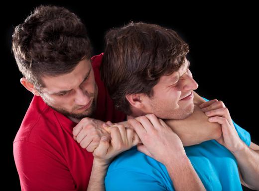 A rear naked choke is used to cut off an opponent's blood flow through the carotid artery.