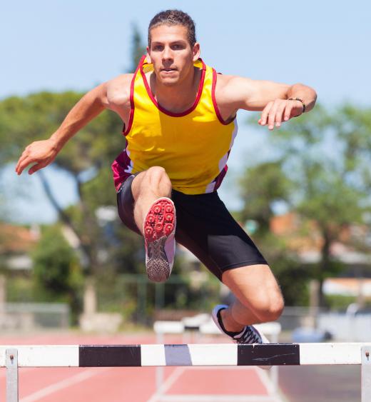 Hurdles are a running event in which the participants must leap over barriers.