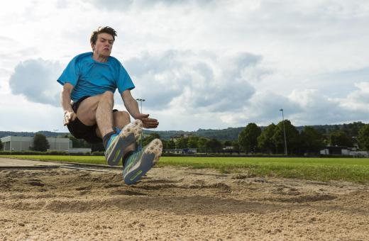 The length of a long jump is determined by where a jumper lands in a sandpit.