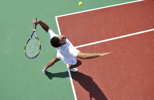 The movement of the body and arm are very important in a tennis serve.