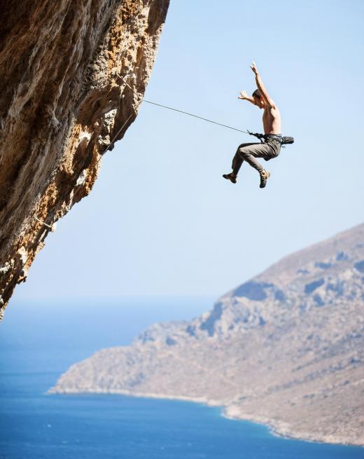 Rock climbers use abseiling to return to the base of a cliff or wall.