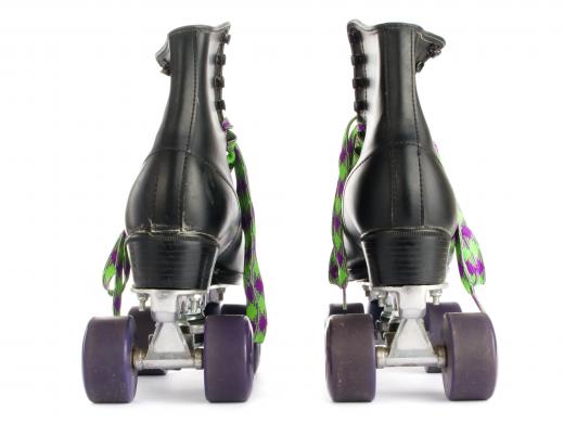 Roller skates have two wheels in front and two wheels in back of the skate.
