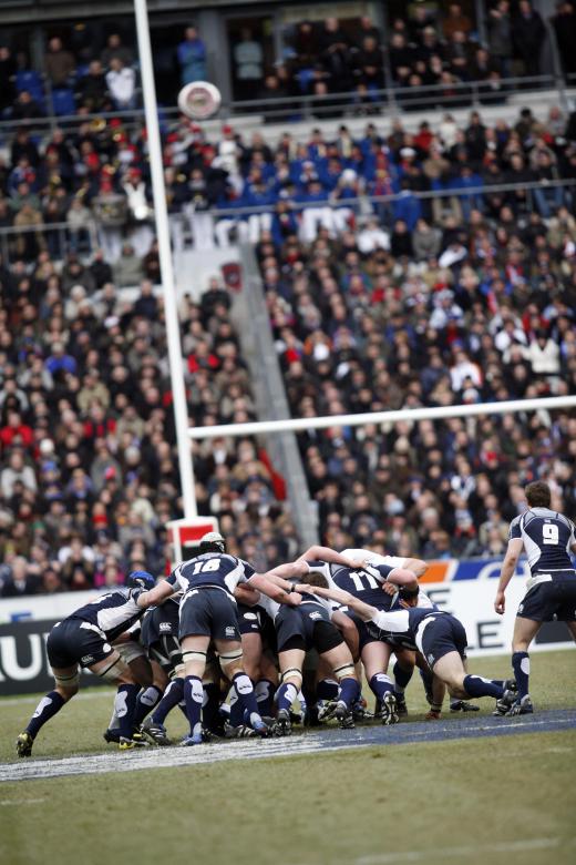 Rugby game in a stadium.