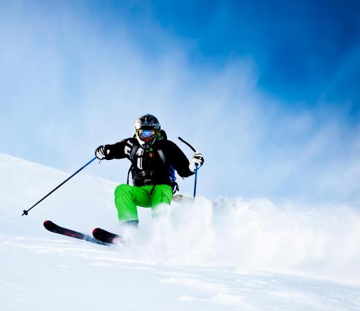 Skiers use the edge of their skis to make turns, or carve.