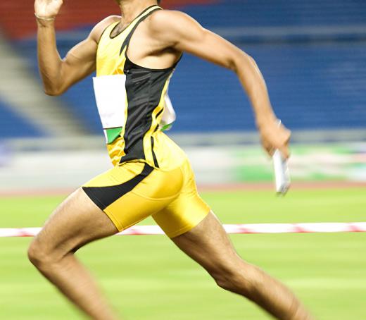 Runners in track events must react immediately at the start of a race.