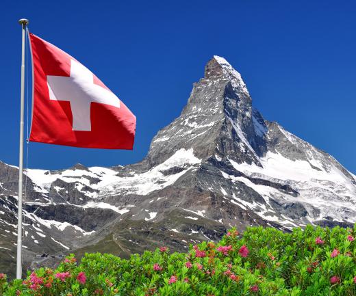 The Swiss flag with the Matterhorn in the background.