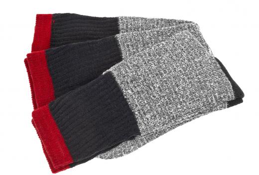 Thick socks can be weather appropriate when monoskiing in cold climates.
