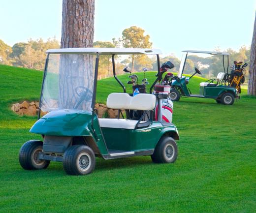 Some caddies will drive a golf cart to transport a golfer and his equipment.