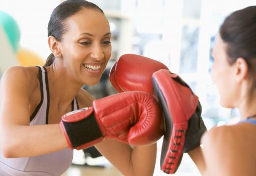 Sparring gloves provide more padding than those used for competitive bouts.