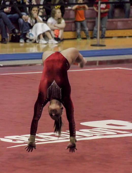 Tumblers may perform flips and somersaults during a routine.