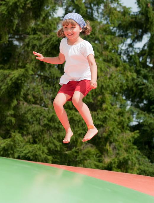 Gymnastics for children may include jumping on a trampoline.